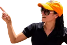 lady pointing at sign